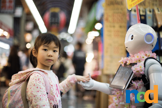 Little girl with a pink sweater and backpack holding hands with a robot