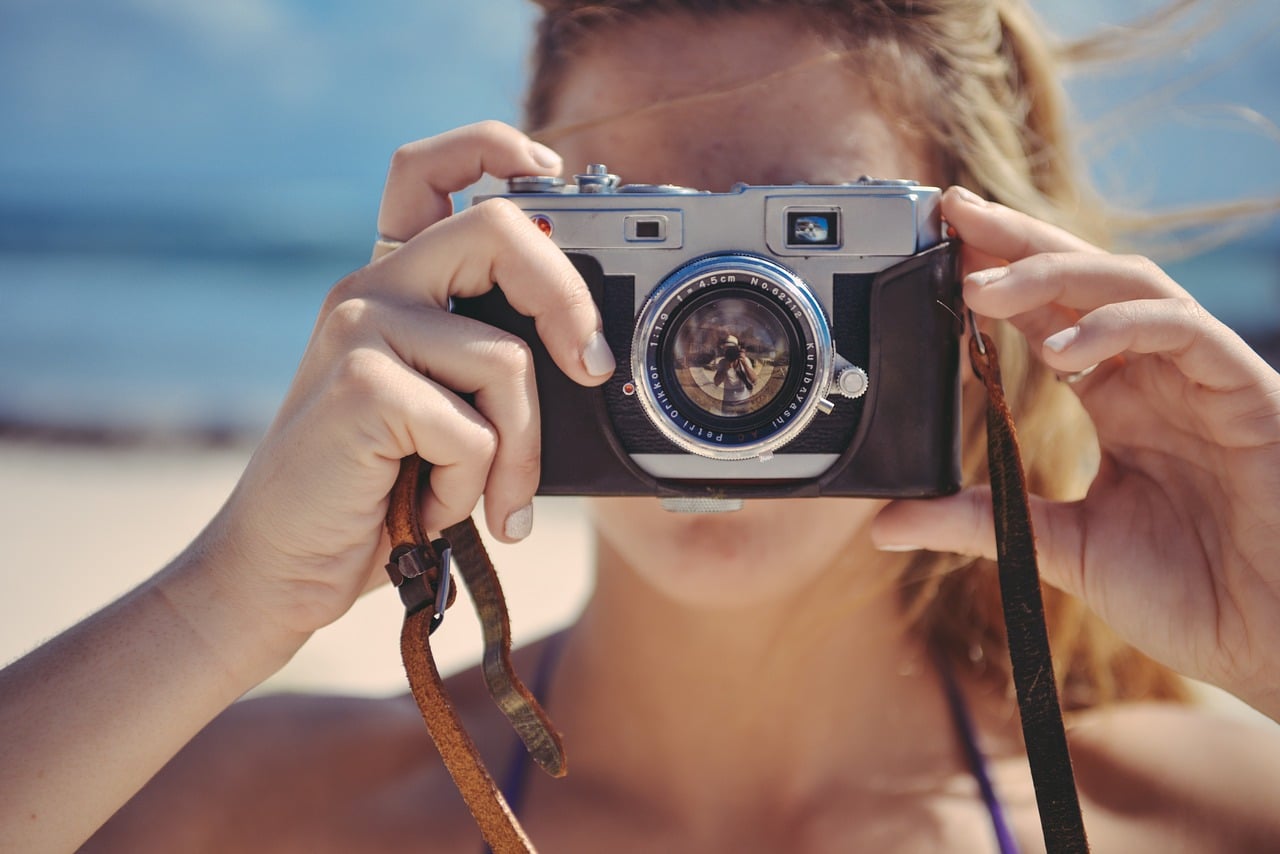 girl taking photo