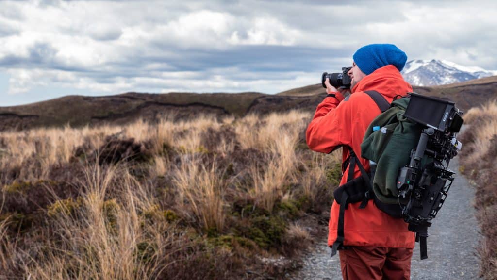 Photographer outdoors on a hike