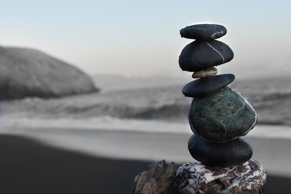 Managing Client Relations - stacked rocks